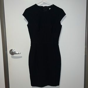 Cute Black Form Fitting Dress -knee long with small slit in back
